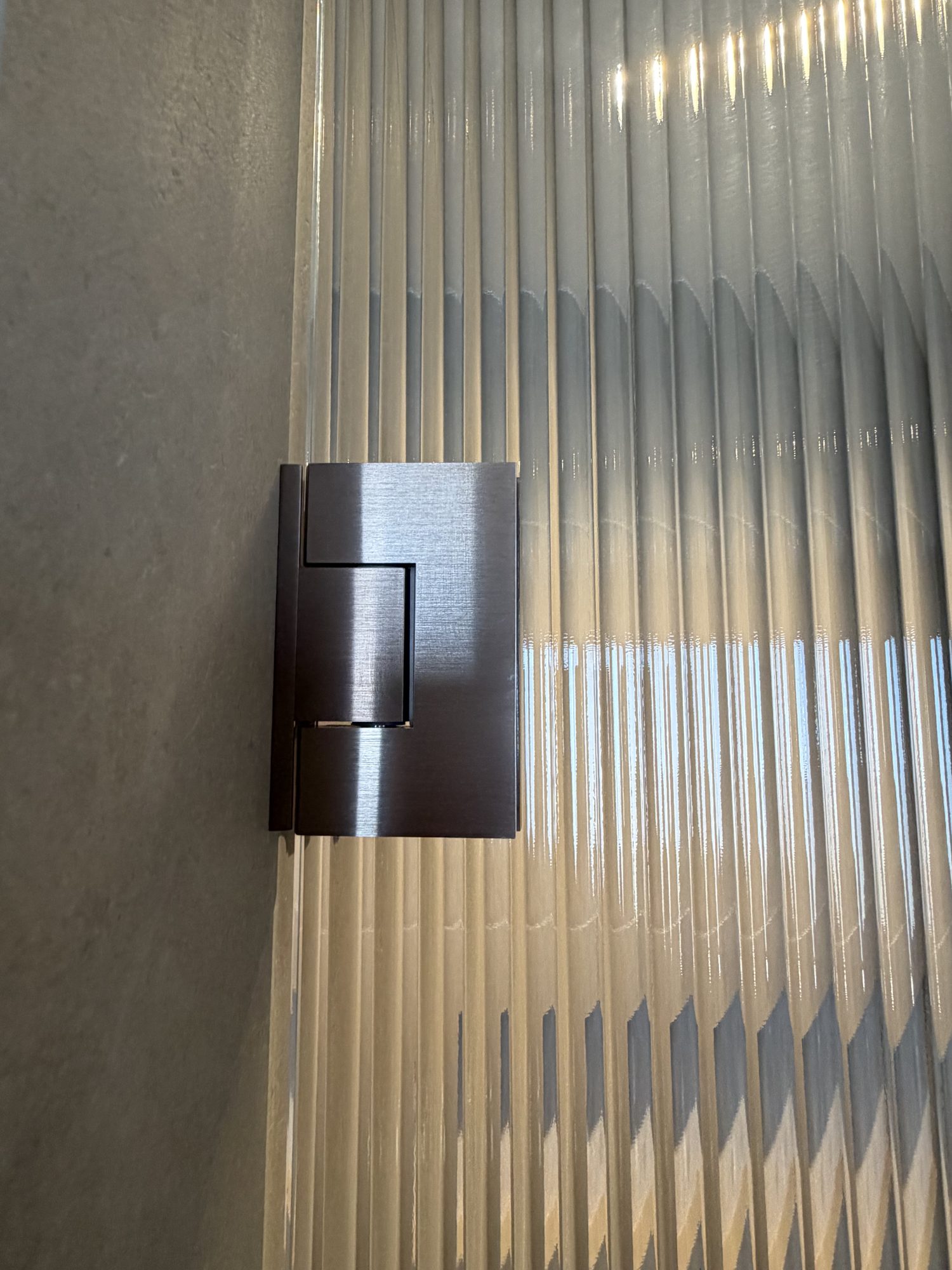 Fluted glass bronze hinge — Adelaide, Unique Glass Solutions