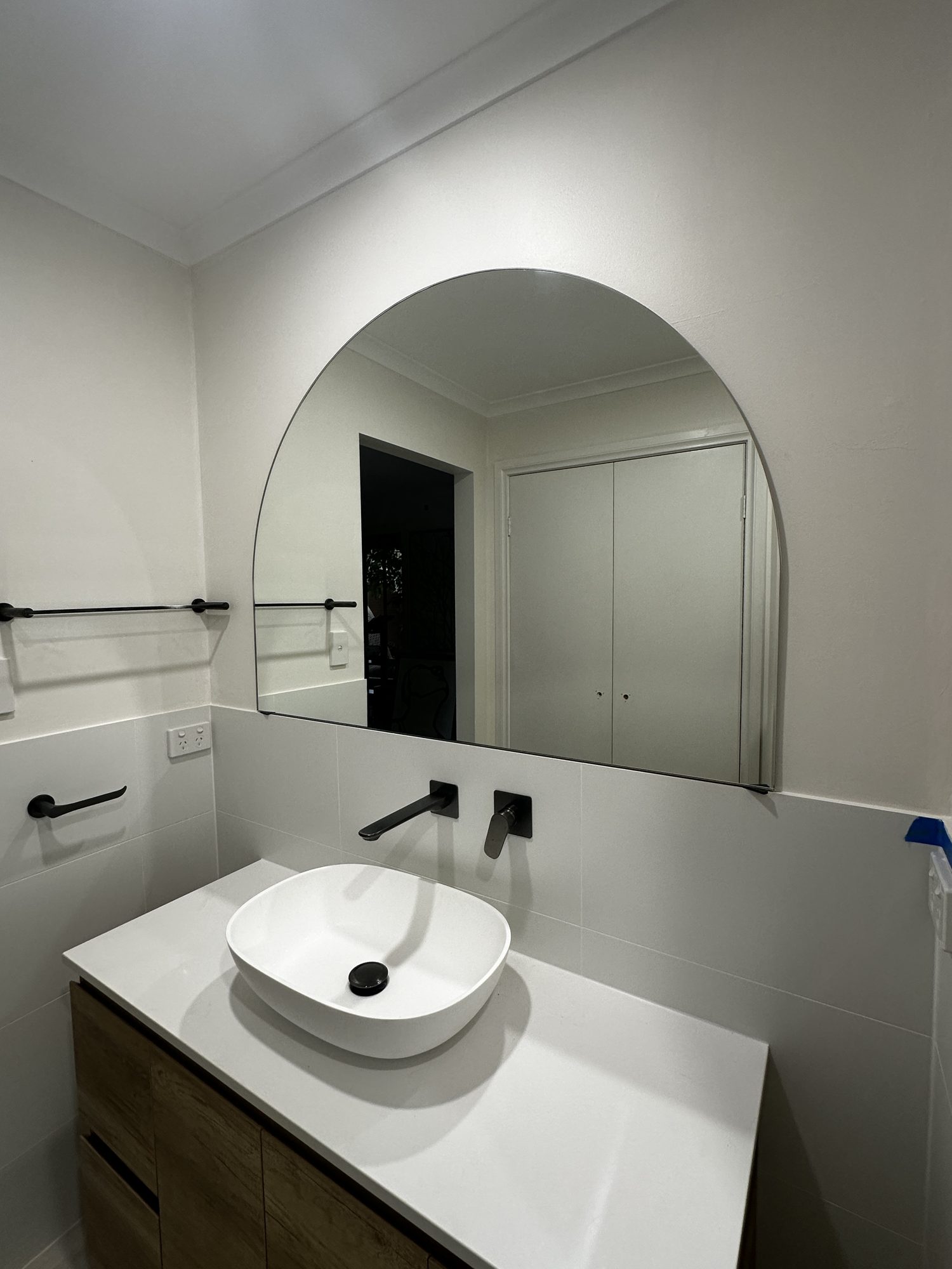 Arched mirror over vanity, Adelaide