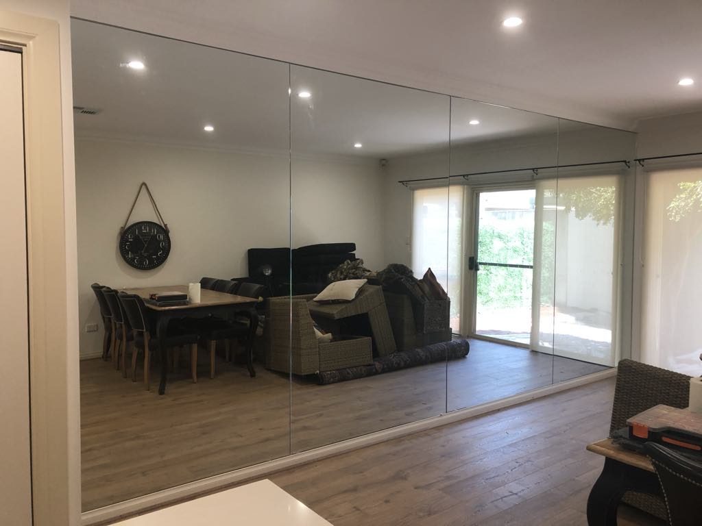 Full-wall mirror in living area, Adelaide