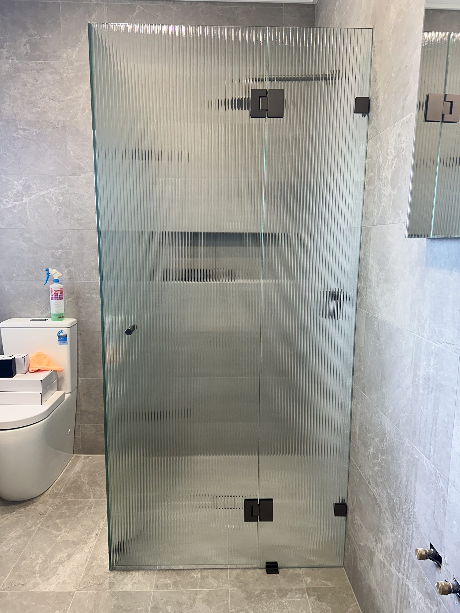 Fluted panel black hardware — Adelaide, Unique Glass Solutions
