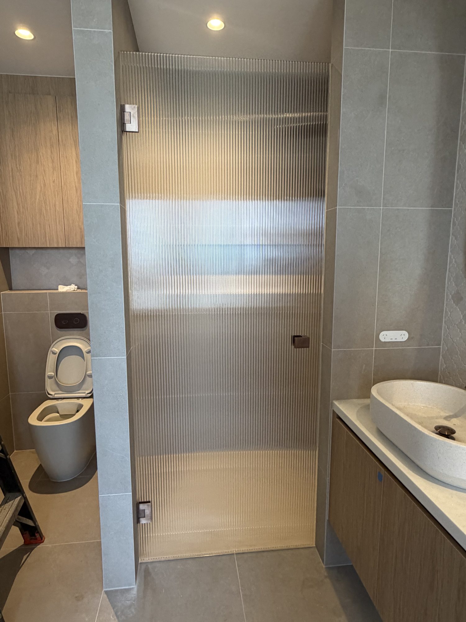 Fluted wc door timber vanity — Adelaide, Unique Glass Solutions