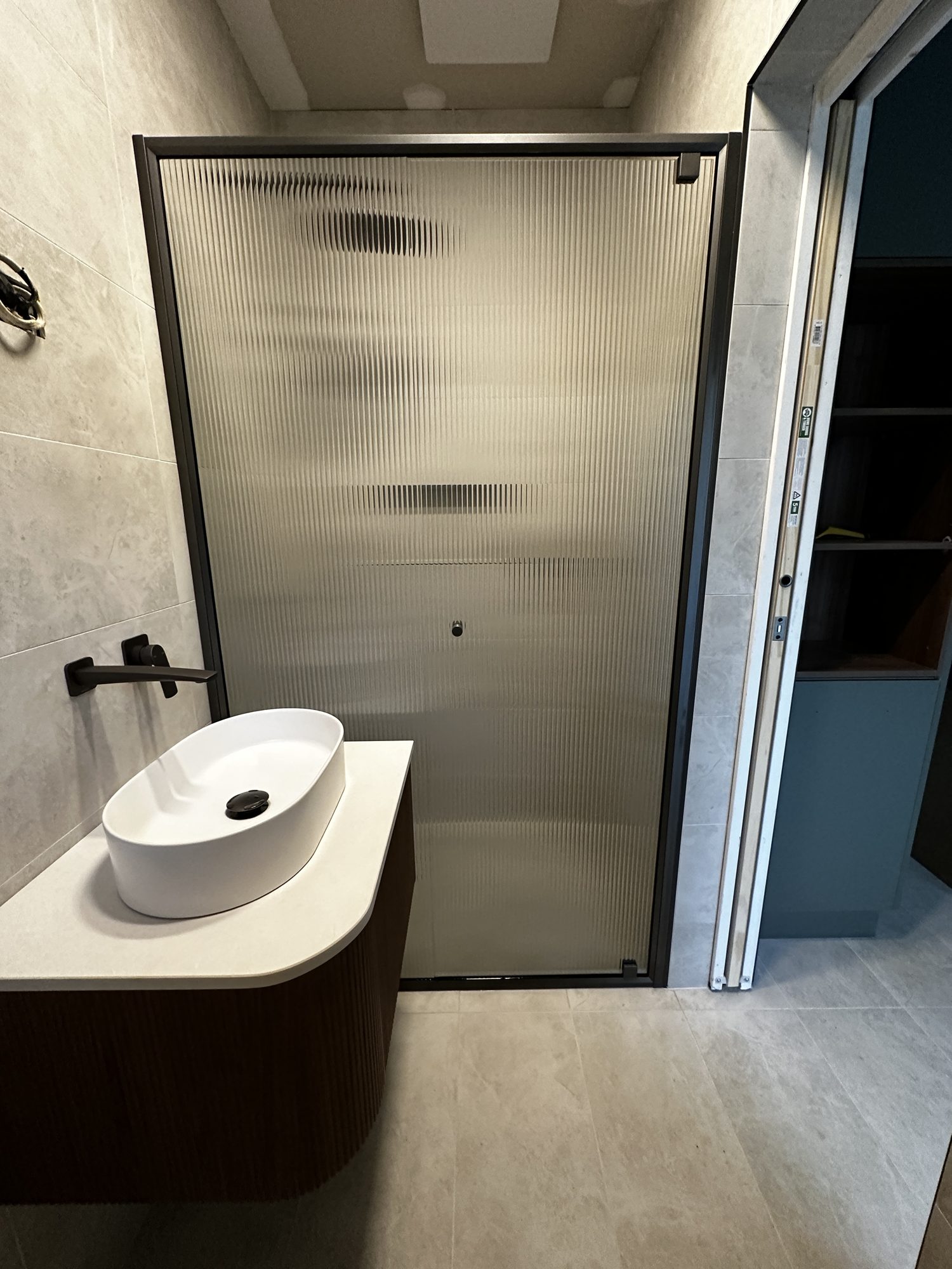 Reeded black slider ensuite — Adelaide, Unique Glass Solutions