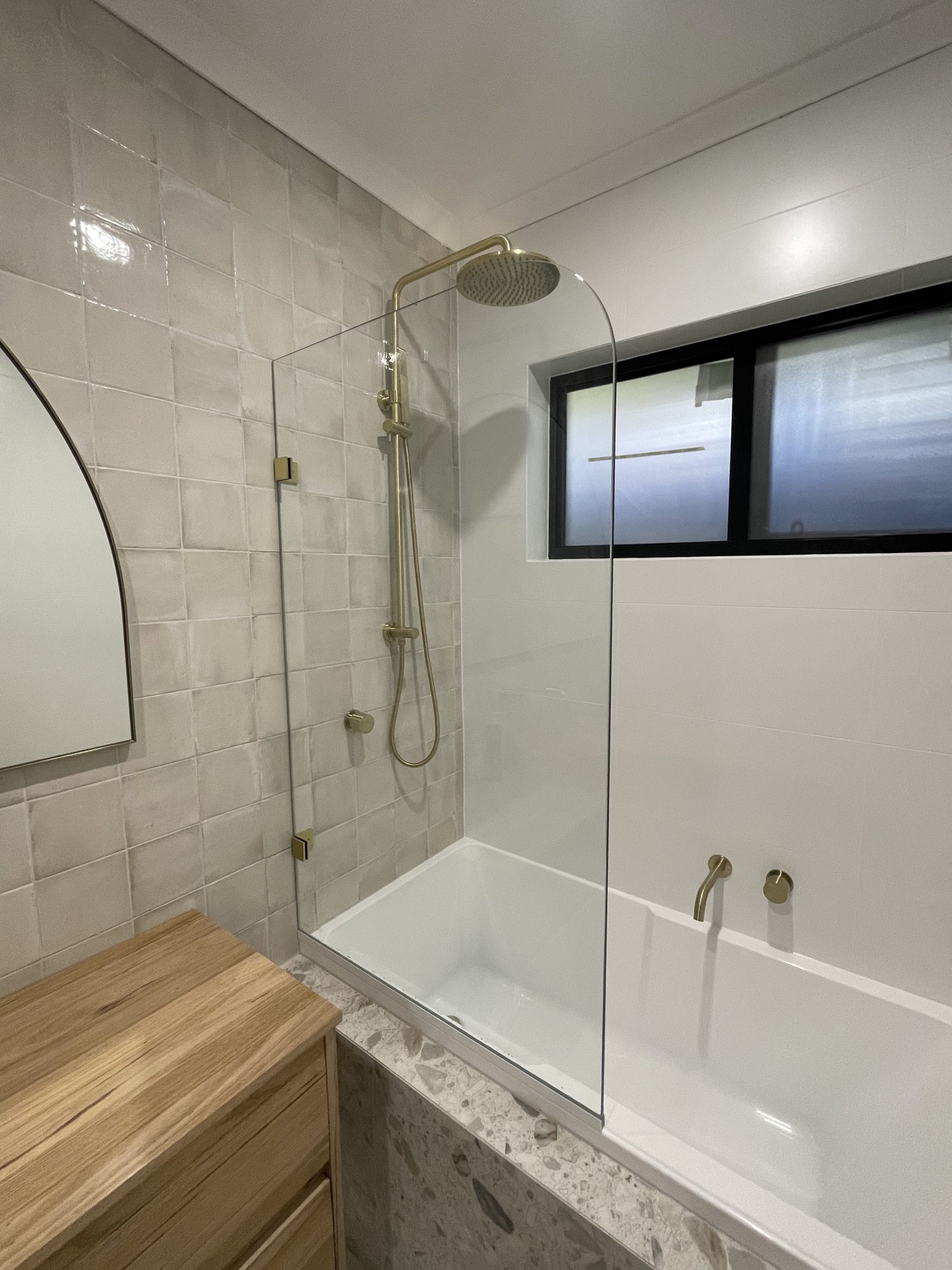 Gold overbath panel arch mirror — Adelaide, Unique Glass Solutions