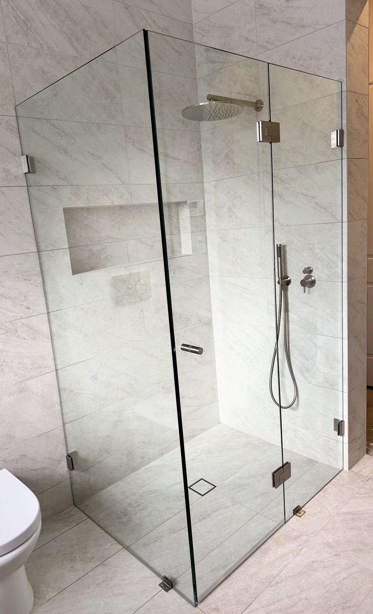 Frameless bronze hinges — Adelaide, Unique Glass Solutions