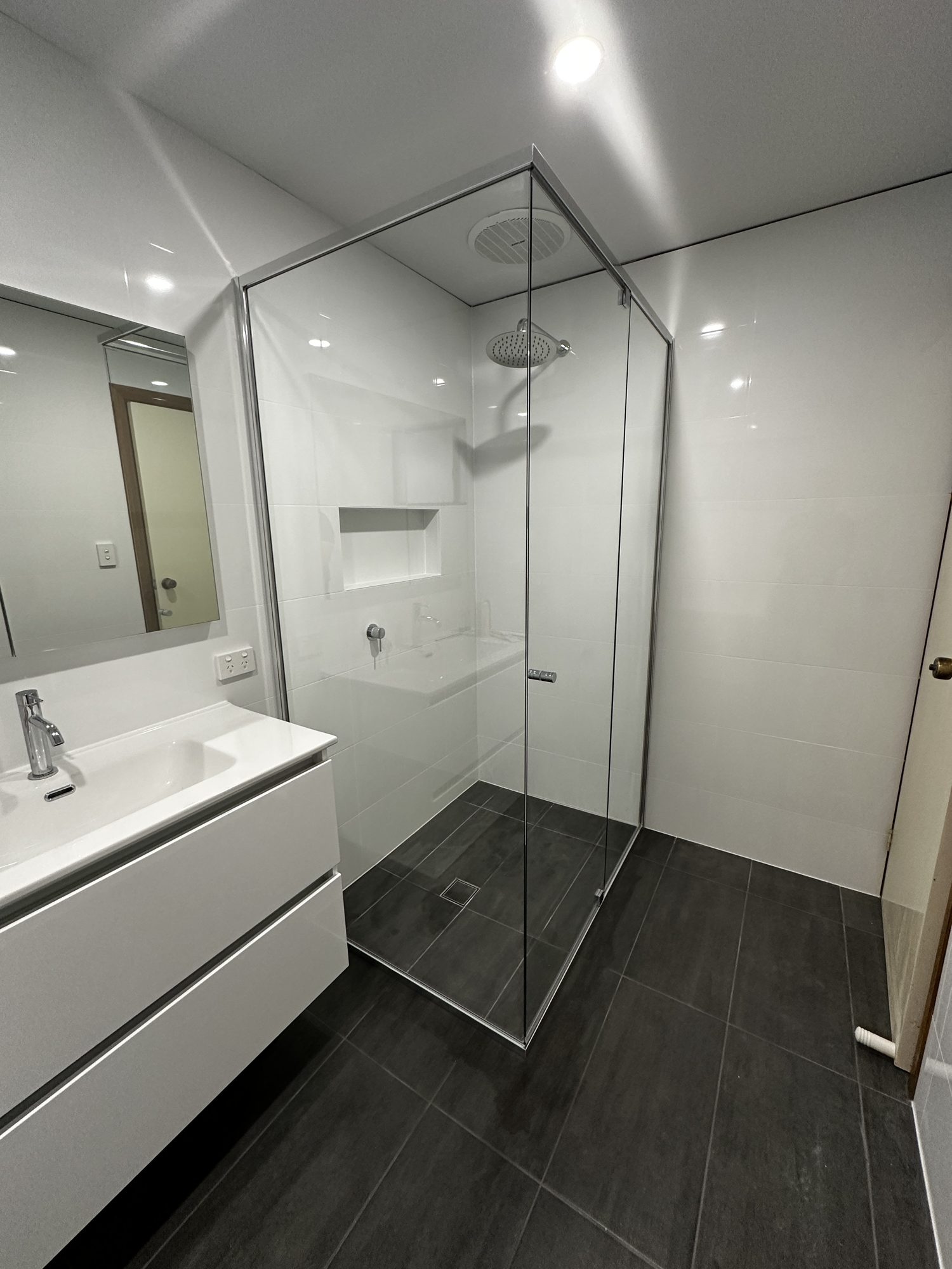Frameless corner dark tile — Adelaide, Unique Glass Solutions