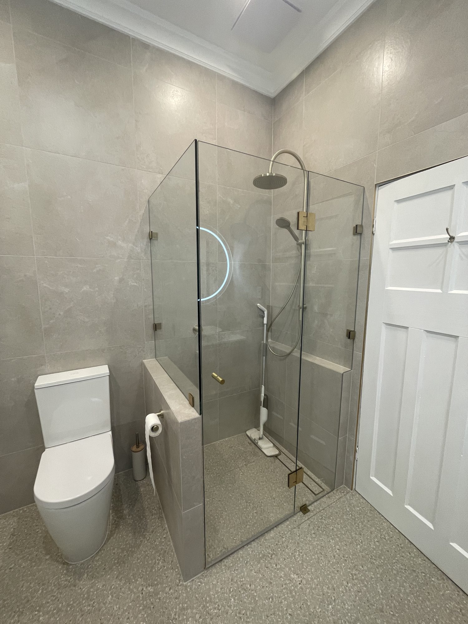 Frameless corner terrazzo floor — Adelaide, Unique Glass Solutions