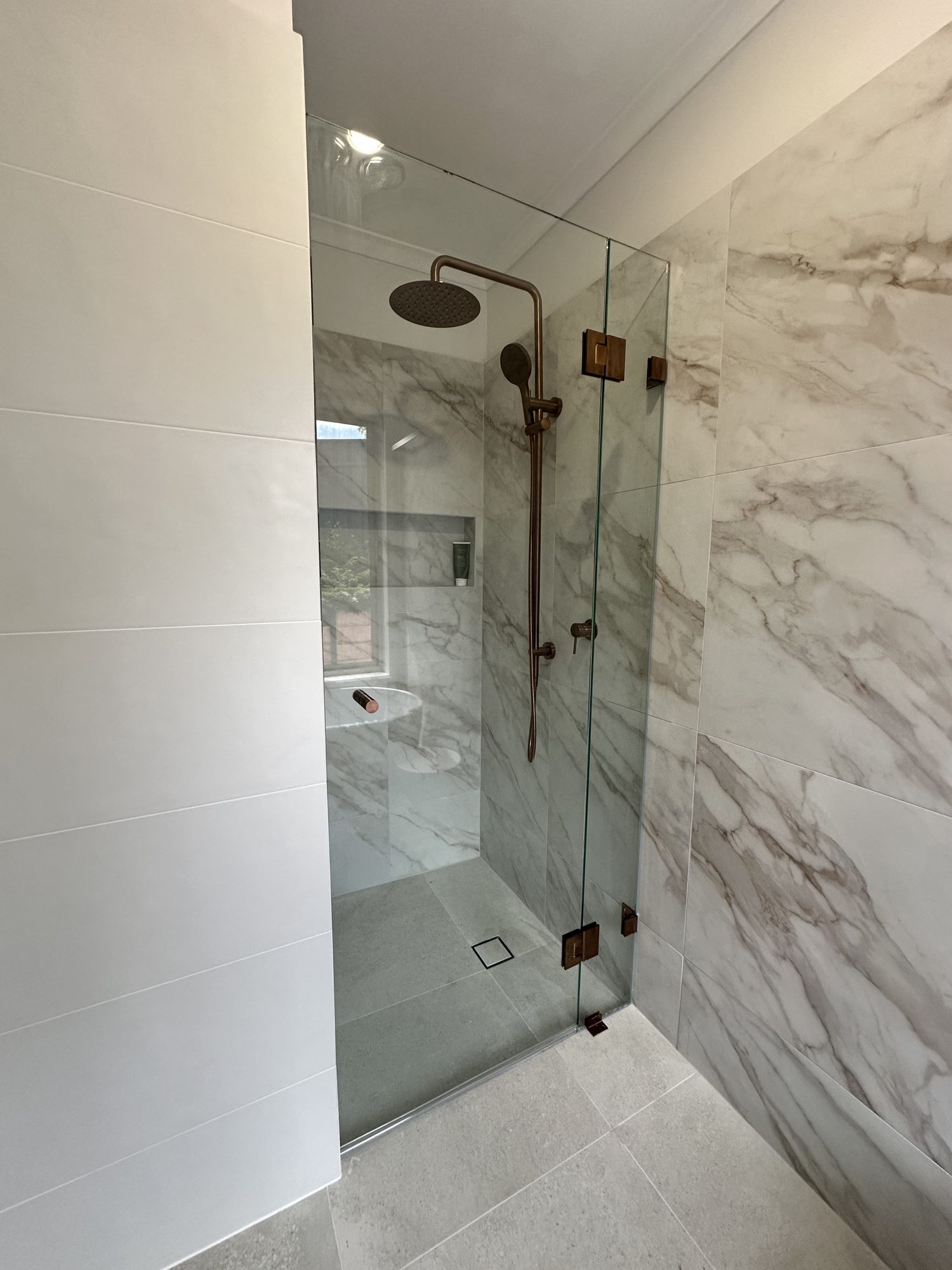 Frameless marble brass — Adelaide, Unique Glass Solutions