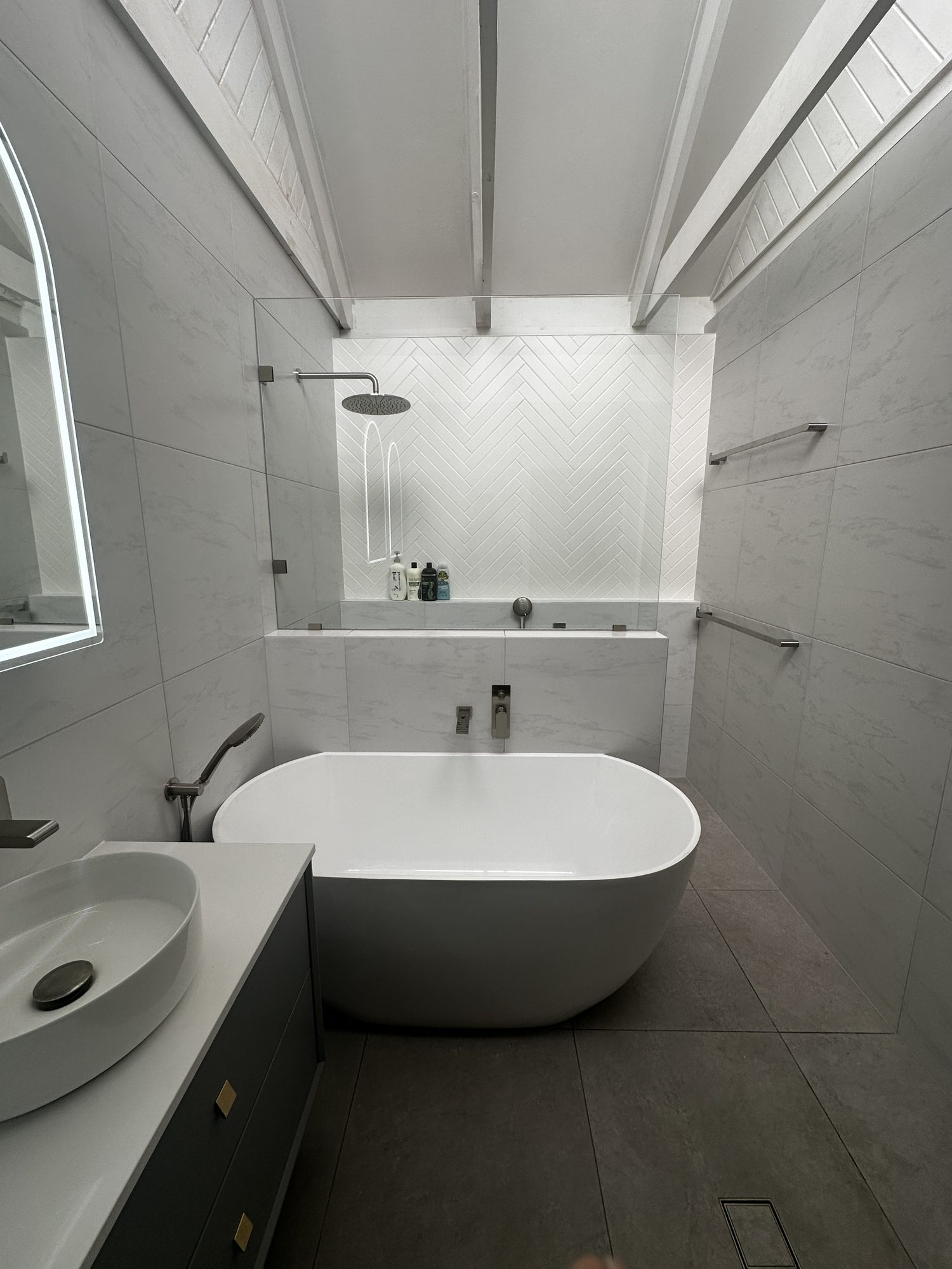 Frameless panel raked ceiling — Adelaide, Unique Glass Solutions