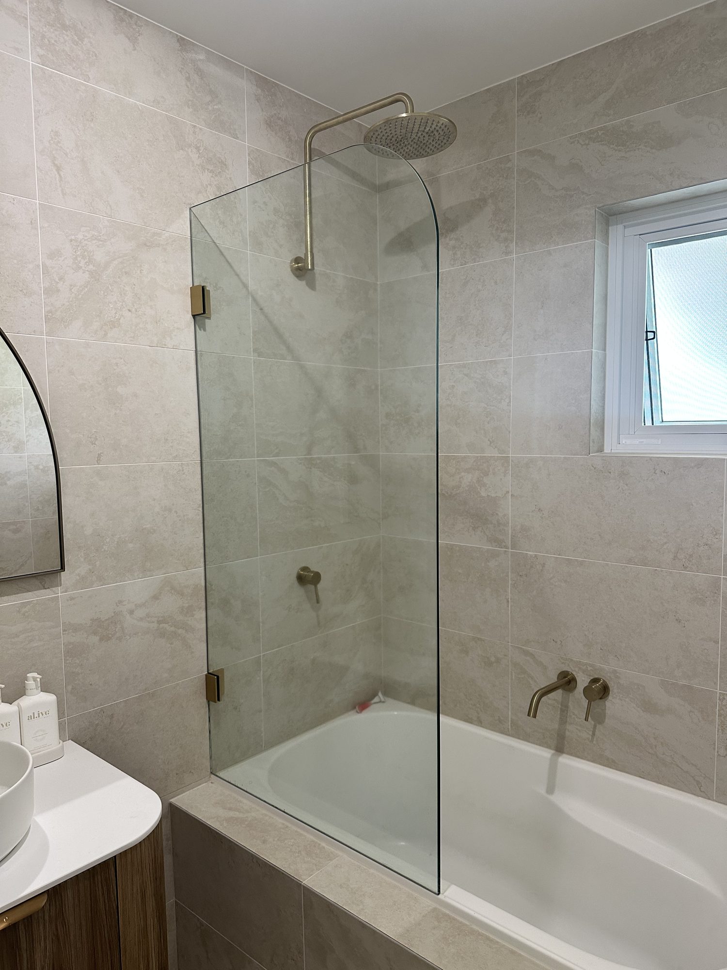 Overbath panel brass — Adelaide, Unique Glass Solutions